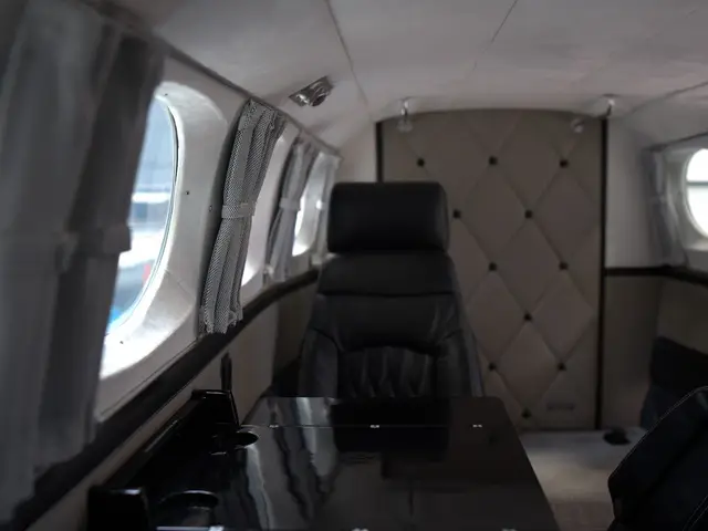 Club seating with quilted sidewall in a Cessna 340 cabin