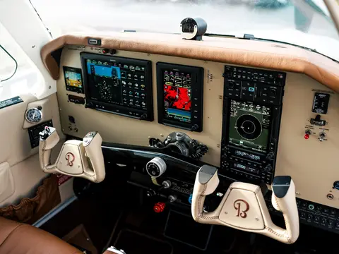 Cockpit with dual yokes and cream leather trim
