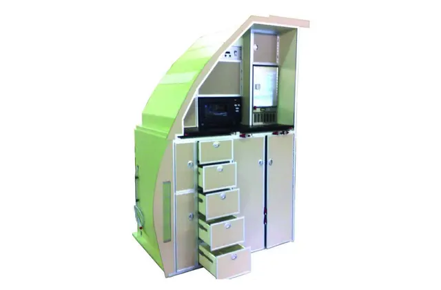 Render of a green and white galley unit with drawers and a trolley bay