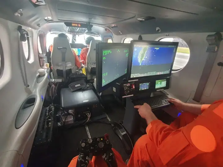 ISR operator at the workstation inside the GOSHAWK cabin
