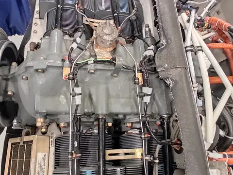 Engine with cowling removed during preheater installation