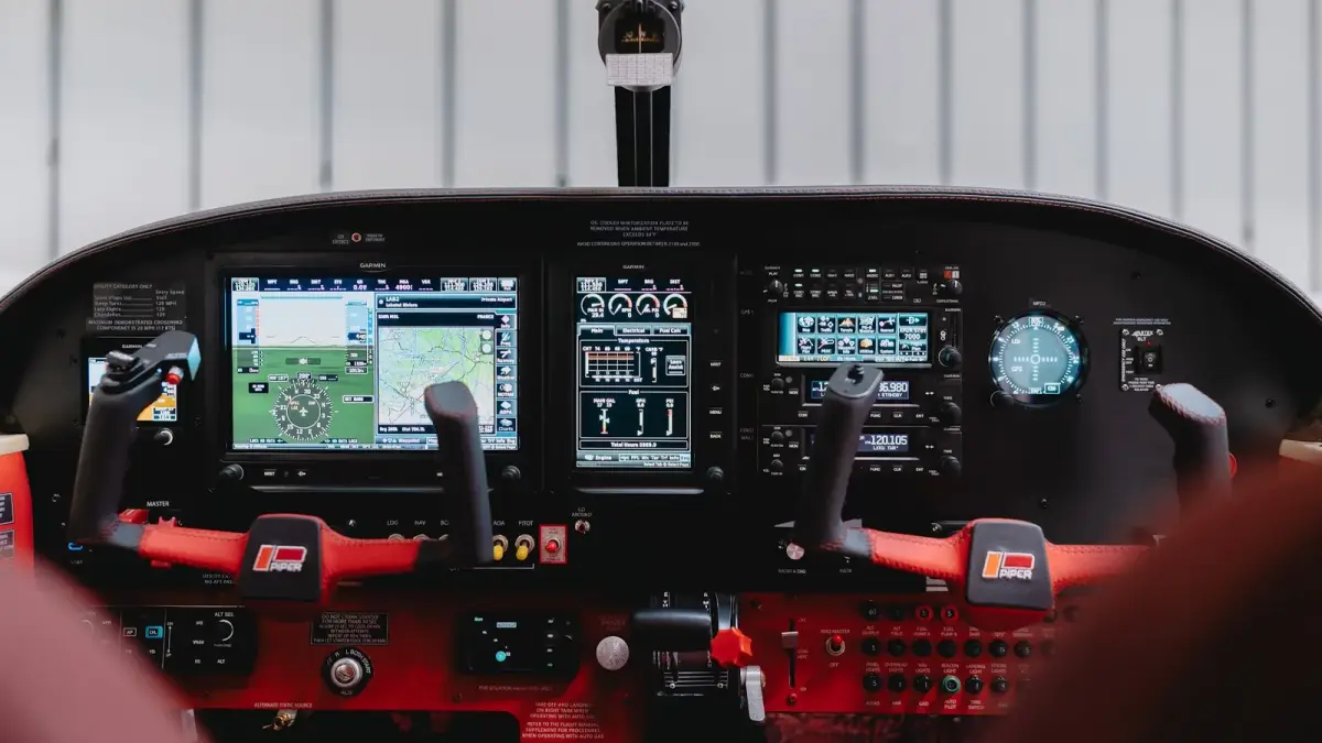 Cherokee cockpit with the new G3X displays and red leather interior
