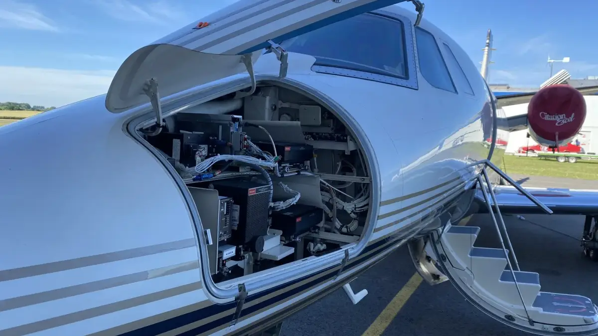 Cessna Citation Excel on the ramp with the nose avionics bay open