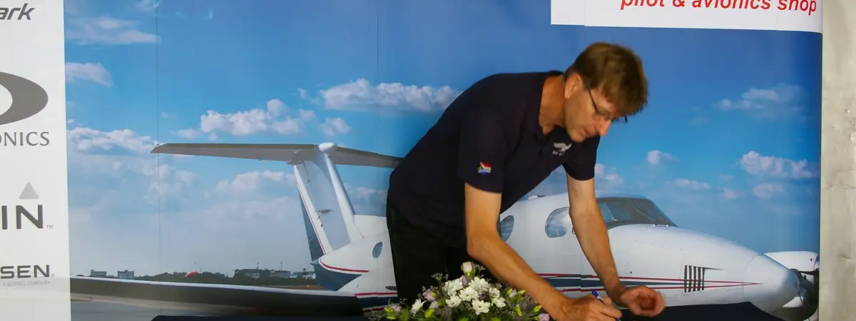 AIR TEAM pilot and avionics shop stand at a trade show