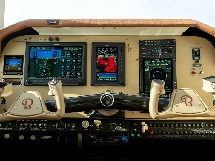 Custom instrument panel in a Beechcraft cockpit with new glass displays