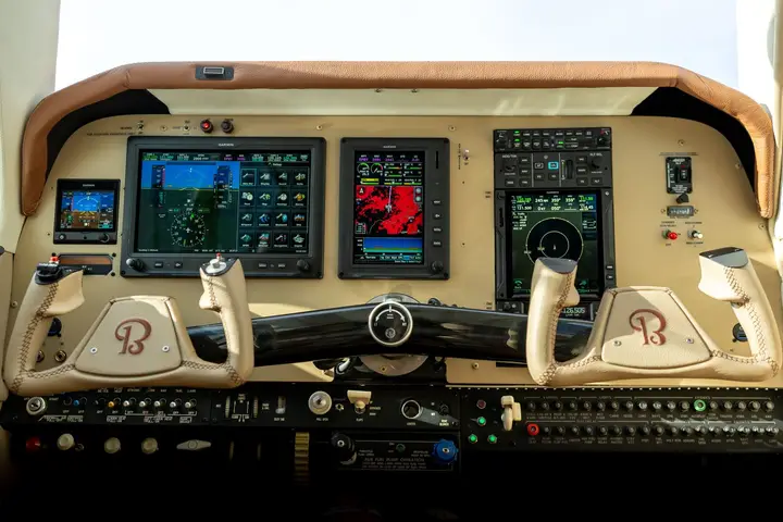 Custom instrument panel with new glass displays in a Beechcraft cockpit
