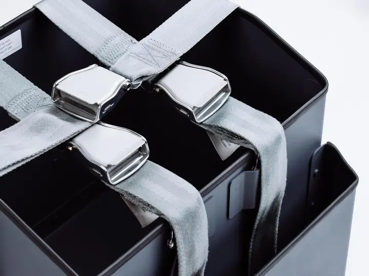 Seat belts and storage bins prepared as restraint systems