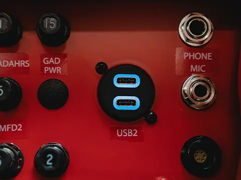 USB charging port in an aircraft cabin