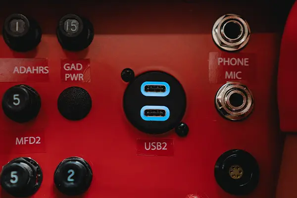USB charger installed in an aircraft interior panel