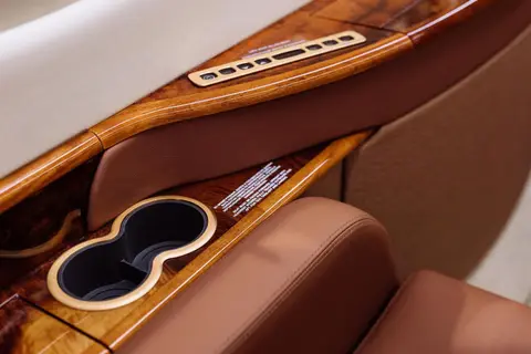 Veneer table and leather seats in a business jet